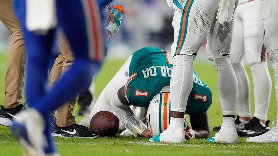 Dolphins' Tua Tagovailoa suffers concussion after big collision with Bills' Damar Hamlin