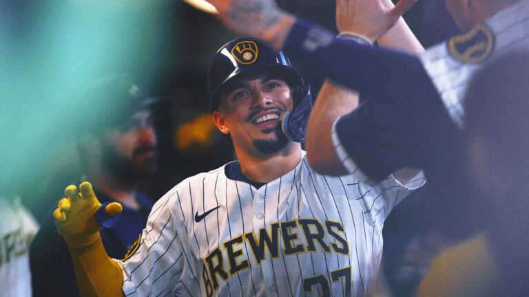 Brewers clinch third NL Central title in four years after Cubs lose to A's