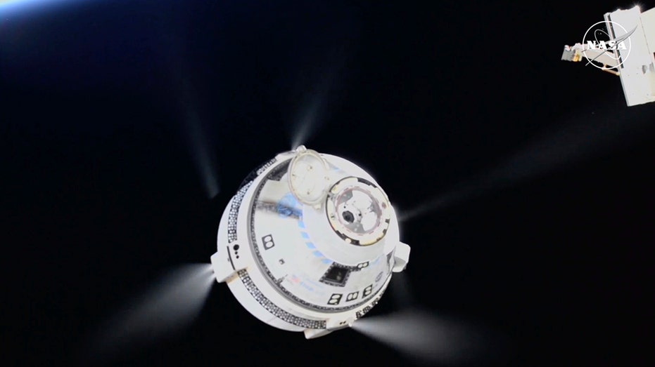 Boeing Starliner undocks from space station, heads back to Earth unmanned as crew stays behind