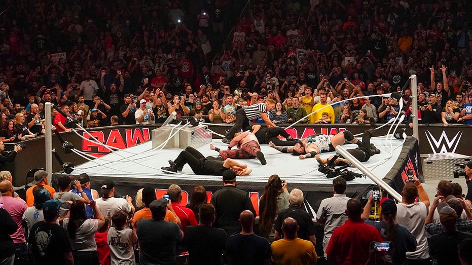 WWE ring collapses during last monster standing match