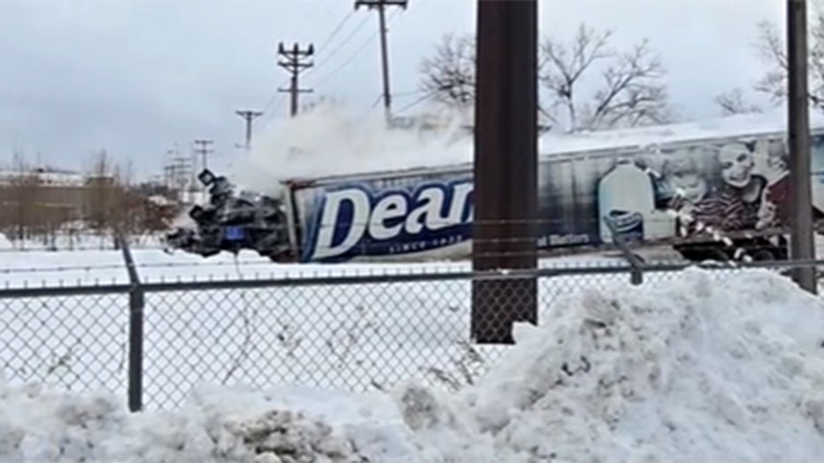 Pennsylvania train slams into milk truck, video shows