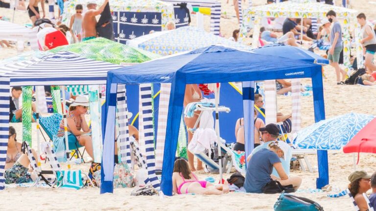 Debate over using beach cabanas at popular travel destination prompts prime minister to weigh in