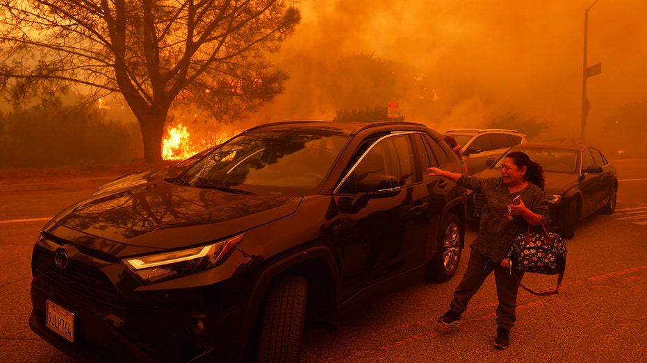 Pacific Palisades wildfire forces thousands to flee California homes; museum closes