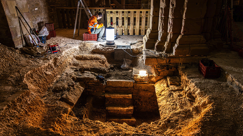 Hidden staircase in church leads archaeologists to unearth 400-year-old burial vault